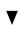 Black Medium Down-Pointing Triangle Centred